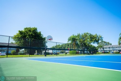 ENJOY THE CONVENIENCE OF FIRST FLOOR LIVING IN THIS ONE BEDROOM on Hillsboro Pines Golf in Florida - for sale on GolfHomes.com, golf home, golf lot