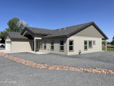 Beautiful new build overlooking the golf course, featuring on Snowflake Municipal Golf Course in Arizona - for sale on GolfHomes.com, golf home, golf lot