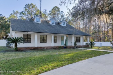 Beautifully updated all brick home nestled on 2.09 acres. 3 Bed on Palm Valley Golf Club in Florida - for sale on GolfHomes.com, golf home, golf lot