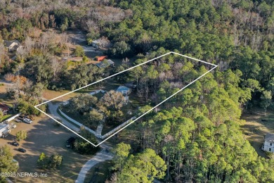 Beautifully updated all brick home nestled on 2.09 acres. 3 Bed on Palm Valley Golf Club in Florida - for sale on GolfHomes.com, golf home, golf lot