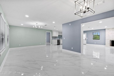 Beautifully updated all brick home nestled on 2.09 acres. 3 Bed on Palm Valley Golf Club in Florida - for sale on GolfHomes.com, golf home, golf lot