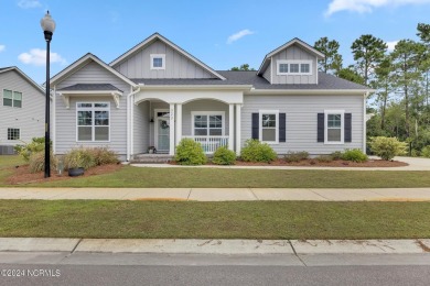 Discover this charming 3-bedroom, 3-bathroom home in the on Olde Point Golf and Country Club in North Carolina - for sale on GolfHomes.com, golf home, golf lot