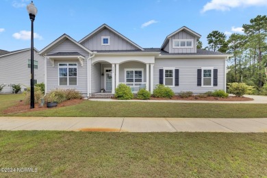 Discover this charming 3-bedroom, 3-bathroom home in the on Olde Point Golf and Country Club in North Carolina - for sale on GolfHomes.com, golf home, golf lot