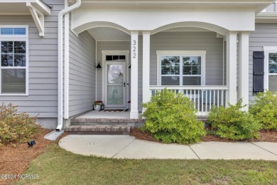 Discover this charming 3-bedroom, 3-bathroom home in the on Olde Point Golf and Country Club in North Carolina - for sale on GolfHomes.com, golf home, golf lot