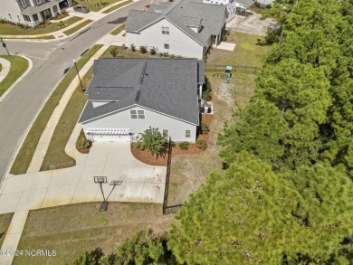 Discover this charming 3-bedroom, 3-bathroom home in the on Olde Point Golf and Country Club in North Carolina - for sale on GolfHomes.com, golf home, golf lot