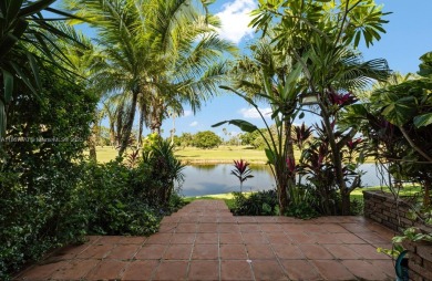 Stunning 3-level with breathtaking golf course and water views on Country Club of Miami in Florida - for sale on GolfHomes.com, golf home, golf lot