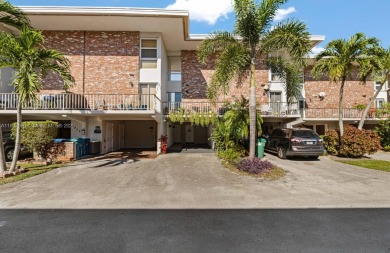 Stunning 3-level with breathtaking golf course and water views on Country Club of Miami in Florida - for sale on GolfHomes.com, golf home, golf lot