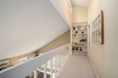 Nestled on a serene, wooded lot and backing up to protected on Birchwood Farms Golf and Country Club in Michigan - for sale on GolfHomes.com, golf home, golf lot