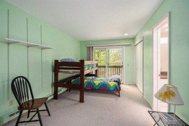 Nestled on a serene, wooded lot and backing up to protected on Birchwood Farms Golf and Country Club in Michigan - for sale on GolfHomes.com, golf home, golf lot