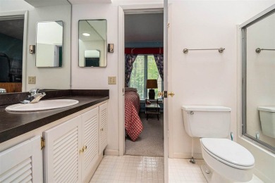 Nestled on a serene, wooded lot and backing up to protected on Birchwood Farms Golf and Country Club in Michigan - for sale on GolfHomes.com, golf home, golf lot