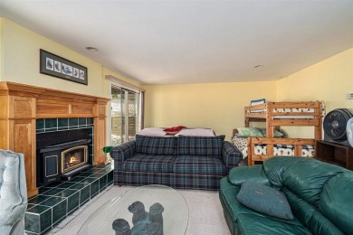 Nestled on a serene, wooded lot and backing up to protected on Birchwood Farms Golf and Country Club in Michigan - for sale on GolfHomes.com, golf home, golf lot