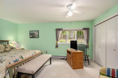 Nestled on a serene, wooded lot and backing up to protected on Birchwood Farms Golf and Country Club in Michigan - for sale on GolfHomes.com, golf home, golf lot