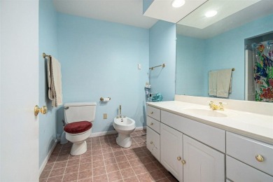 Nestled on a serene, wooded lot and backing up to protected on Birchwood Farms Golf and Country Club in Michigan - for sale on GolfHomes.com, golf home, golf lot