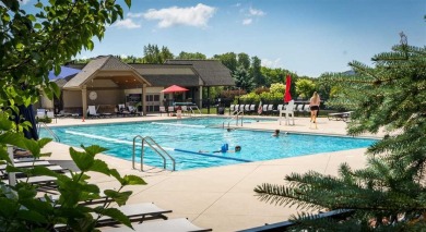 Nestled on a serene, wooded lot and backing up to protected on Birchwood Farms Golf and Country Club in Michigan - for sale on GolfHomes.com, golf home, golf lot