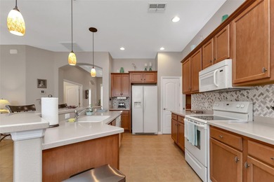 AWESOME OPEN CONCEPT in this FULLY FURNISHED/TURNKEY Legacy on Kings Gate Golf Club in Florida - for sale on GolfHomes.com, golf home, golf lot