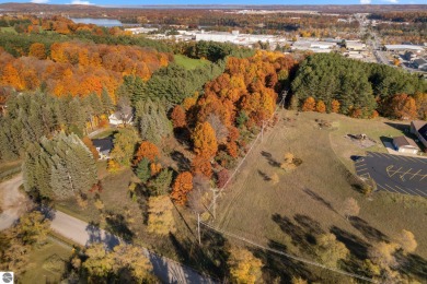 Fantastic multi-family zoned parcel, strategically located on Traverse City Golf and Country Club in Michigan - for sale on GolfHomes.com, golf home, golf lot