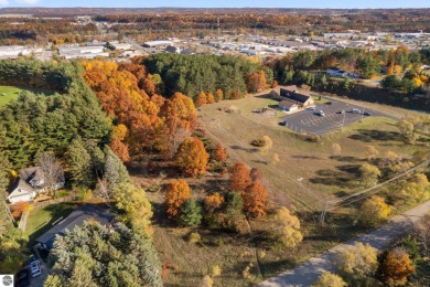 Fantastic multi-family zoned parcel, strategically located on Traverse City Golf and Country Club in Michigan - for sale on GolfHomes.com, golf home, golf lot