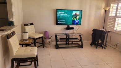 Great clean first floor unit in a quiet building with ample on Hillsboro Pines Golf in Florida - for sale on GolfHomes.com, golf home, golf lot