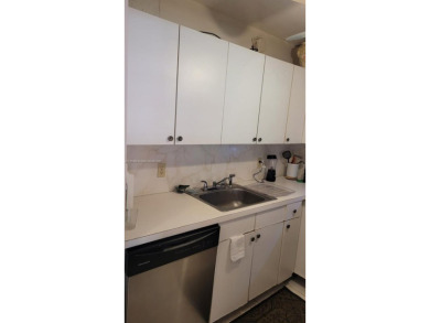 Great clean first floor unit in a quiet building with ample on Hillsboro Pines Golf in Florida - for sale on GolfHomes.com, golf home, golf lot