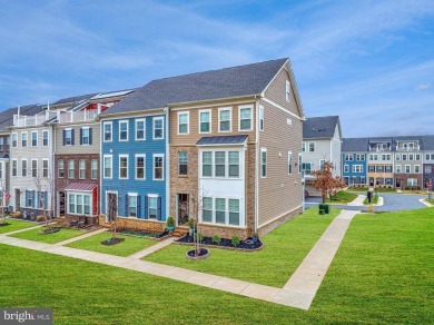 Introducing this stunning 3-story end unit townhome that on Potomac Shores Golf Club in Virginia - for sale on GolfHomes.com, golf home, golf lot