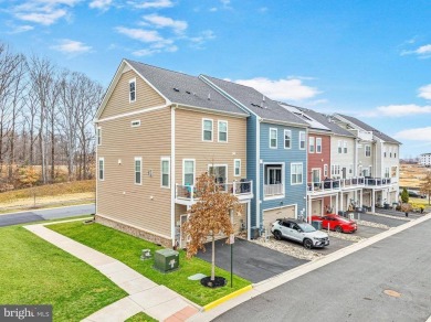 Introducing this stunning 3-story end unit townhome that on Potomac Shores Golf Club in Virginia - for sale on GolfHomes.com, golf home, golf lot