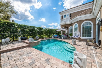 Welcome to 7409 Gathering Ct, a fully remodeled Mediterranean on  in Florida - for sale on GolfHomes.com, golf home, golf lot