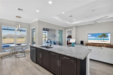 Discover refined lakefront living at 28732 Montecristo Loop in on Palmira Golf and Country Club in Florida - for sale on GolfHomes.com, golf home, golf lot