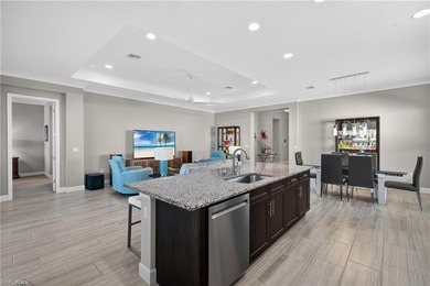 Discover refined lakefront living at 28732 Montecristo Loop in on Palmira Golf and Country Club in Florida - for sale on GolfHomes.com, golf home, golf lot