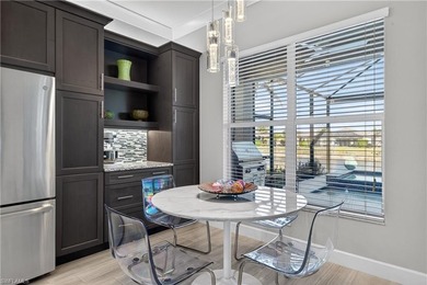 Discover refined lakefront living at 28732 Montecristo Loop in on Palmira Golf and Country Club in Florida - for sale on GolfHomes.com, golf home, golf lot