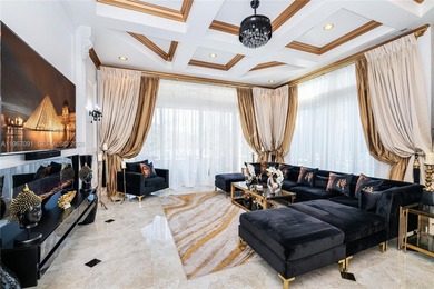 Welcome to 7409 Gathering Ct, a fully remodeled Mediterranean on  in Florida - for sale on GolfHomes.com, golf home, golf lot