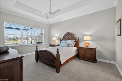 Discover refined lakefront living at 28732 Montecristo Loop in on Palmira Golf and Country Club in Florida - for sale on GolfHomes.com, golf home, golf lot