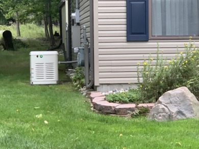 You'll enjoy the quality, 6' walls and workmanship of the lovely on Lost Lake Woods Club in Michigan - for sale on GolfHomes.com, golf home, golf lot