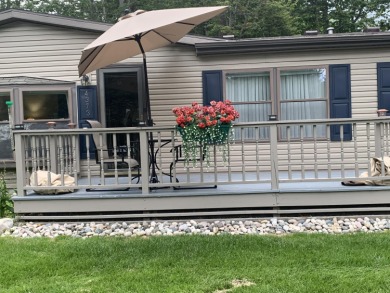 You'll enjoy the quality, 6' walls and workmanship of the lovely on Lost Lake Woods Club in Michigan - for sale on GolfHomes.com, golf home, golf lot
