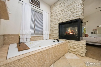 Showstopping 1 1/2-Story Gem in Water Valley! This stunning home on Pelican Lakes Golf and Country Club in Colorado - for sale on GolfHomes.com, golf home, golf lot