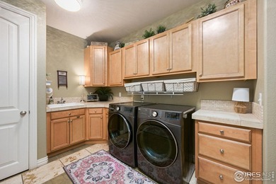 Showstopping 1 1/2-Story Gem in Water Valley! This stunning home on Pelican Lakes Golf and Country Club in Colorado - for sale on GolfHomes.com, golf home, golf lot