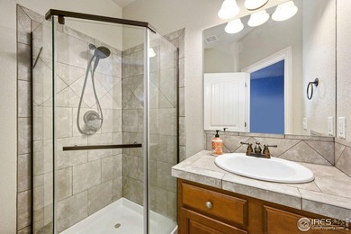 Showstopping 1 1/2-Story Gem in Water Valley! This stunning home on Pelican Lakes Golf and Country Club in Colorado - for sale on GolfHomes.com, golf home, golf lot