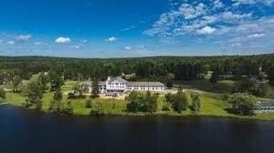 You'll enjoy the quality, 6' walls and workmanship of the lovely on Lost Lake Woods Club in Michigan - for sale on GolfHomes.com, golf home, golf lot