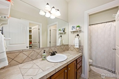 Showstopping 1 1/2-Story Gem in Water Valley! This stunning home on Pelican Lakes Golf and Country Club in Colorado - for sale on GolfHomes.com, golf home, golf lot