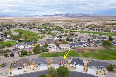 Backing up to the tee green at Hole #2 of The Desert Lakes Golf on  in Nevada - for sale on GolfHomes.com, golf home, golf lot