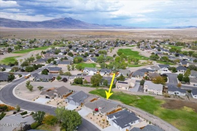 Backing up to the tee green at Hole #2 of The Desert Lakes Golf on  in Nevada - for sale on GolfHomes.com, golf home, golf lot