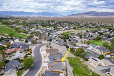 Backing up to the tee green at Hole #2 of The Desert Lakes Golf on  in Nevada - for sale on GolfHomes.com, golf home, golf lot