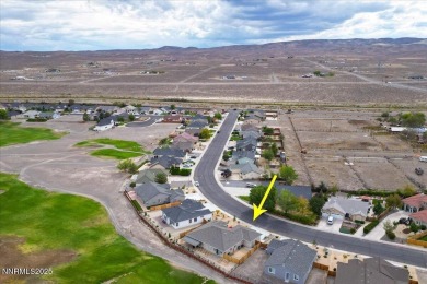 Backing up to the tee green at Hole #2 of The Desert Lakes Golf on  in Nevada - for sale on GolfHomes.com, golf home, golf lot