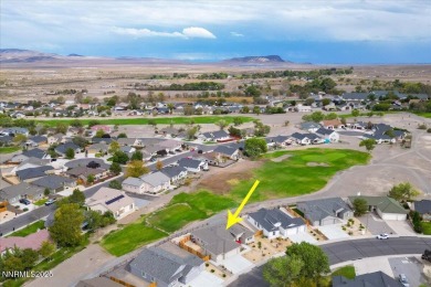 Backing up to the tee green at Hole #2 of The Desert Lakes Golf on  in Nevada - for sale on GolfHomes.com, golf home, golf lot