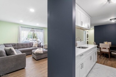 Flooded with natural light, this bright and airy end-unit condo on Quail Brook Golf Course in New Jersey - for sale on GolfHomes.com, golf home, golf lot
