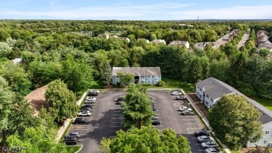 Flooded with natural light, this bright and airy end-unit condo on Quail Brook Golf Course in New Jersey - for sale on GolfHomes.com, golf home, golf lot