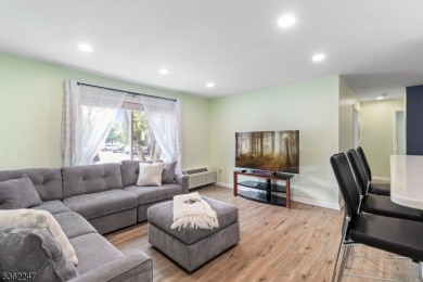 Flooded with natural light, this bright and airy end-unit condo on Quail Brook Golf Course in New Jersey - for sale on GolfHomes.com, golf home, golf lot