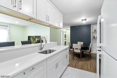 Flooded with natural light, this bright and airy end-unit condo on Quail Brook Golf Course in New Jersey - for sale on GolfHomes.com, golf home, golf lot
