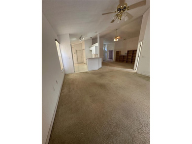 Discover the tranquility you've been searching for in this on Oakwood Golf Club in Florida - for sale on GolfHomes.com, golf home, golf lot