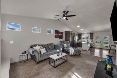 Perfectly positioned along the par-5 10th fairway, this darling on Sky Mountain Golf Course in Utah - for sale on GolfHomes.com, golf home, golf lot