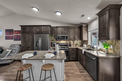 Perfectly positioned along the par-5 10th fairway, this darling on Sky Mountain Golf Course in Utah - for sale on GolfHomes.com, golf home, golf lot